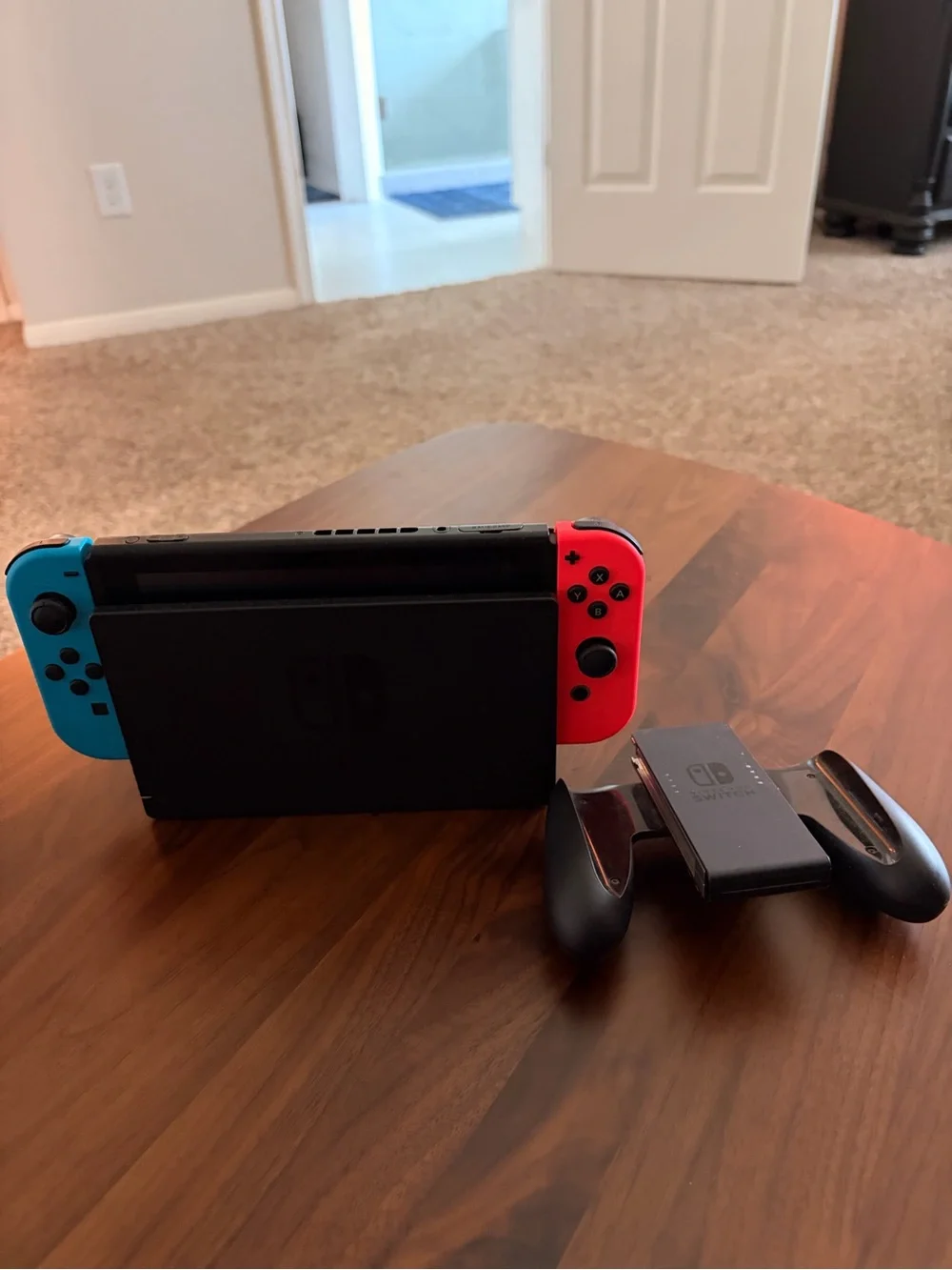 Nintendo Switch with Neon Blue Left Joy‑Con & Neon Red Right Joy‑Con